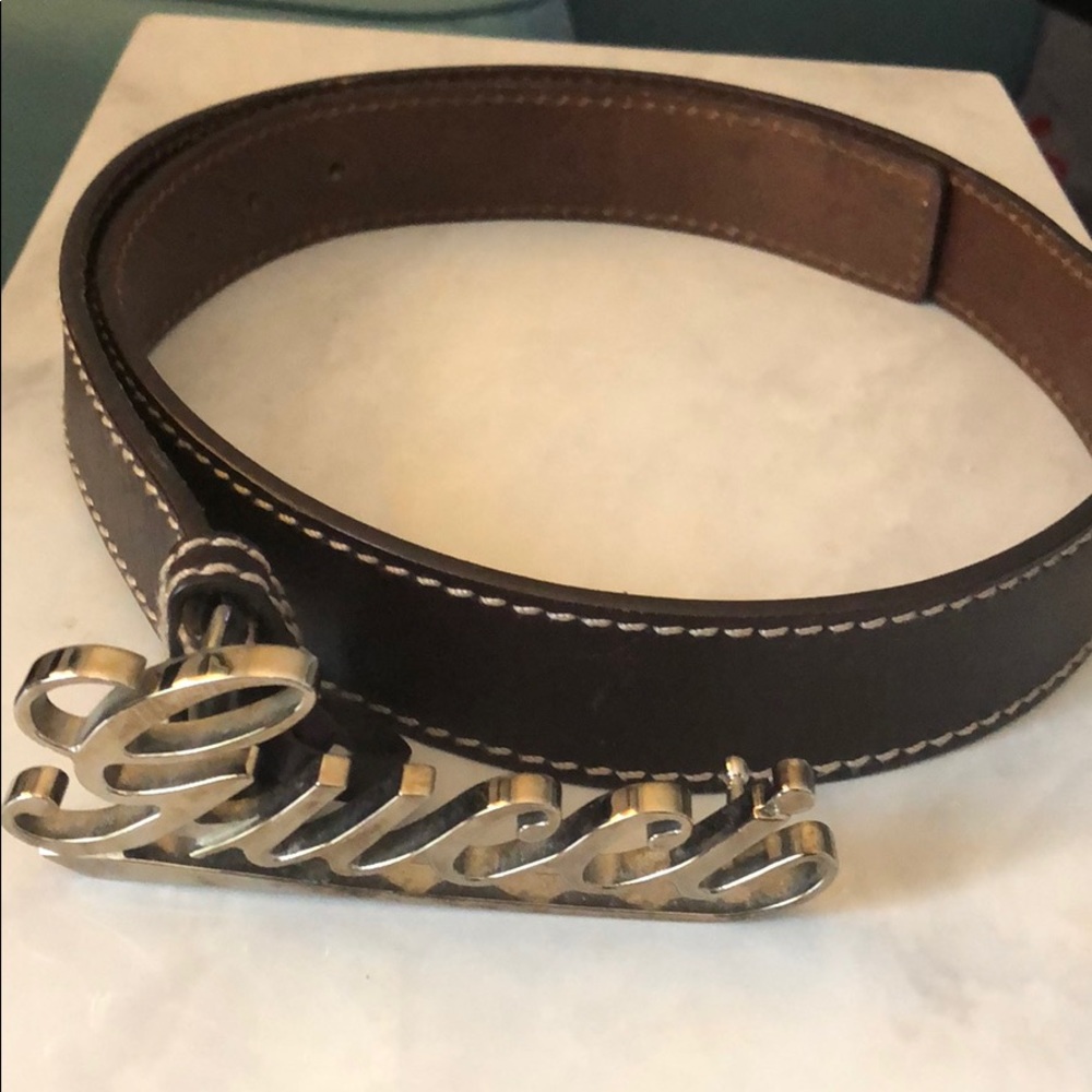 Gucci belt with script “Gucci “